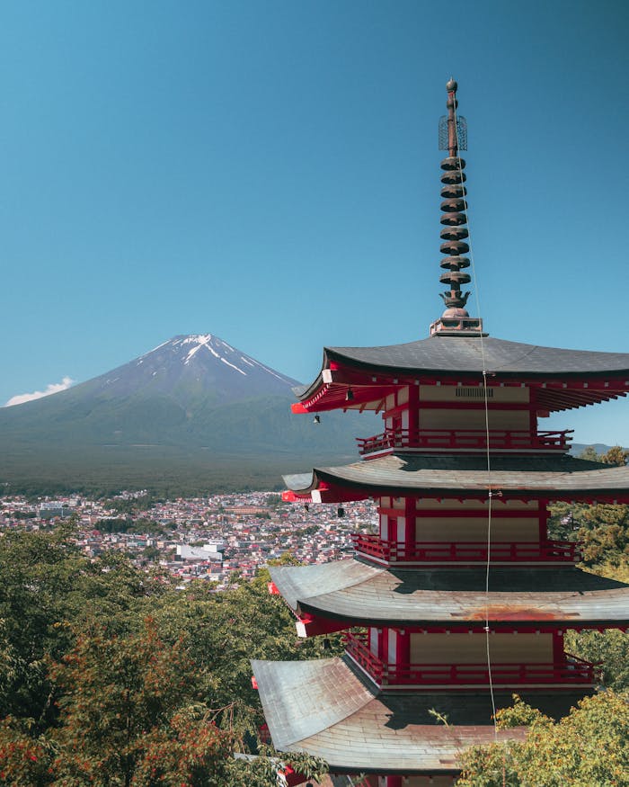 Capture the beauty of Mount Fuji alongside the historic Chureito Pagoda in Japan.